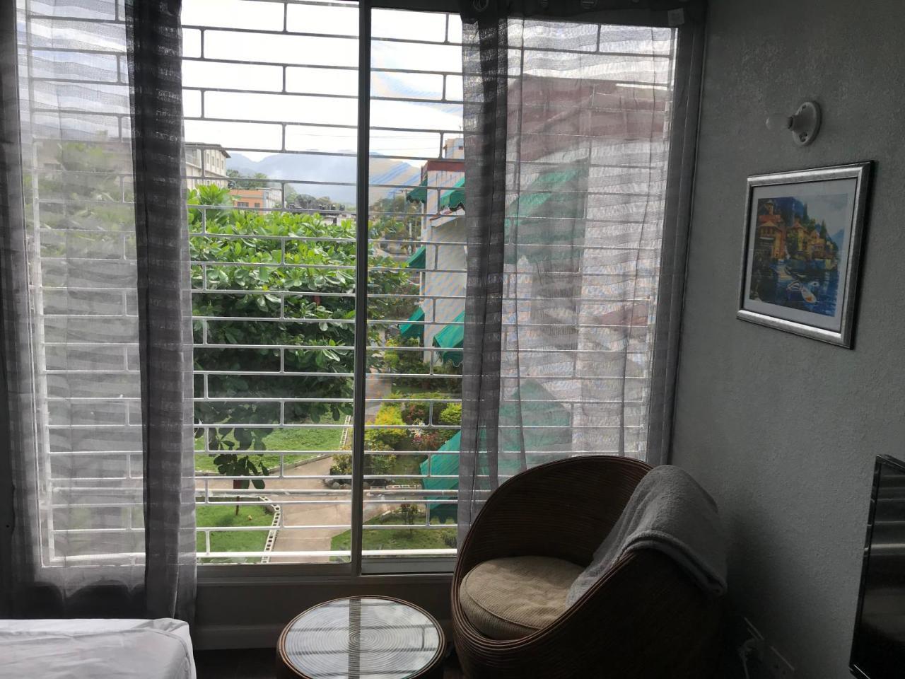 Abacus Jamaica The Zana Suites Кингстон Экстерьер фото