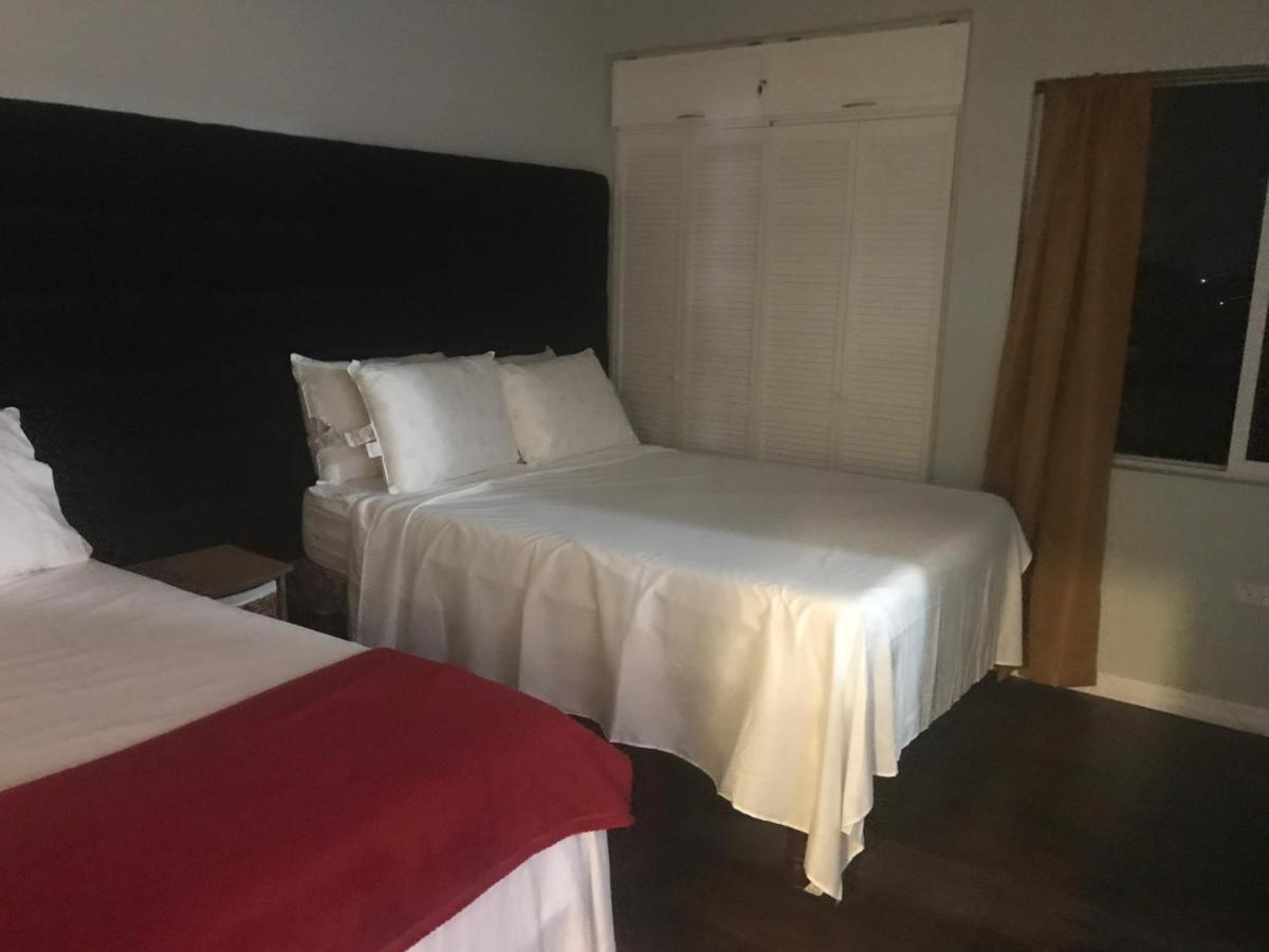Abacus Jamaica The Zana Suites Кингстон Экстерьер фото